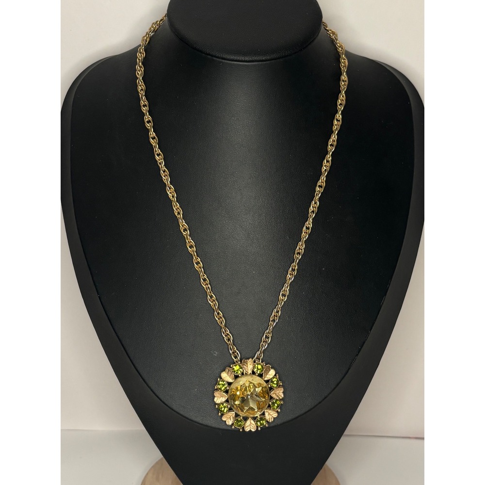 Vintage Avon 1970s Sun Brilliance Pendant Necklace Green Crystal Gold Tone